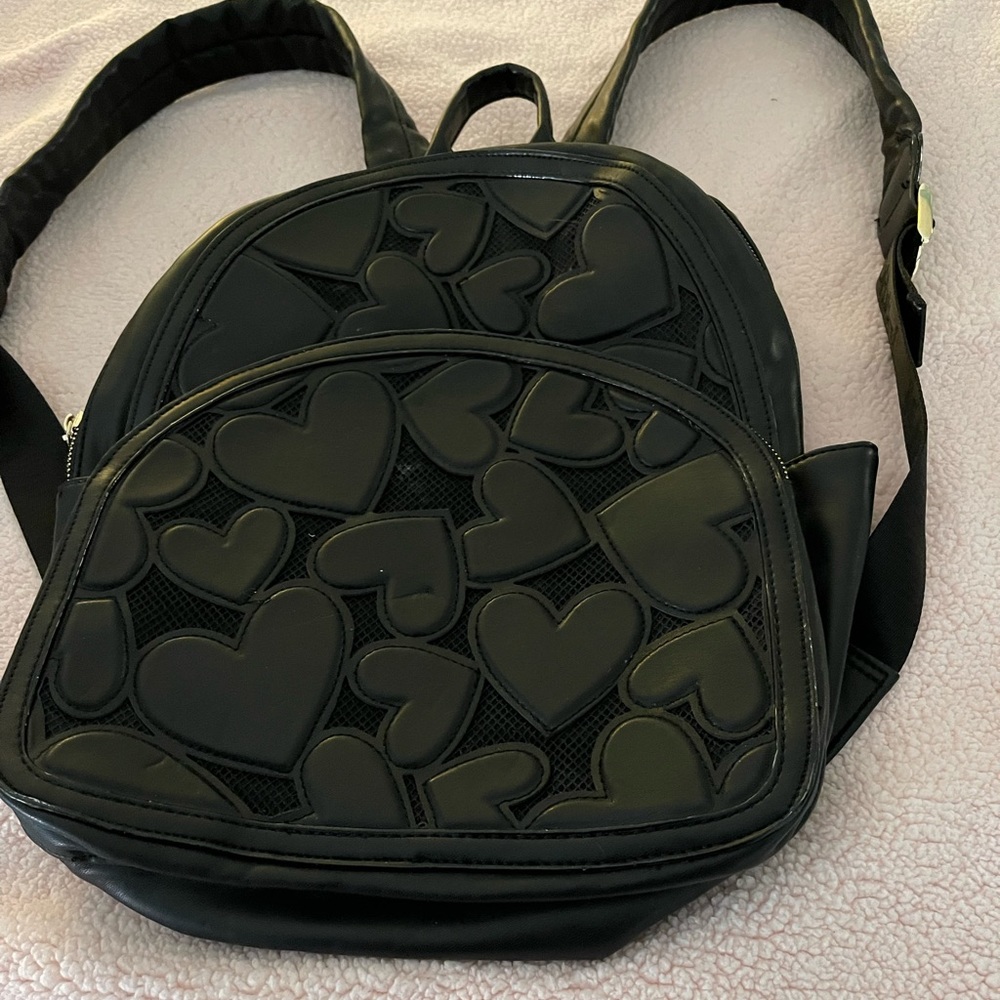 Betsy Johnson black backpack purse.  $10